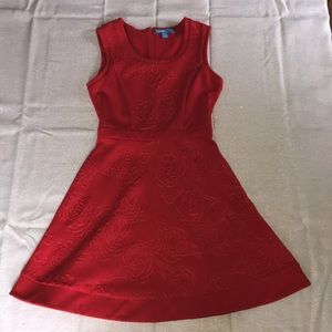 Red dress with textured roses